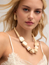 Collana girocollo con perline in legno image number 0