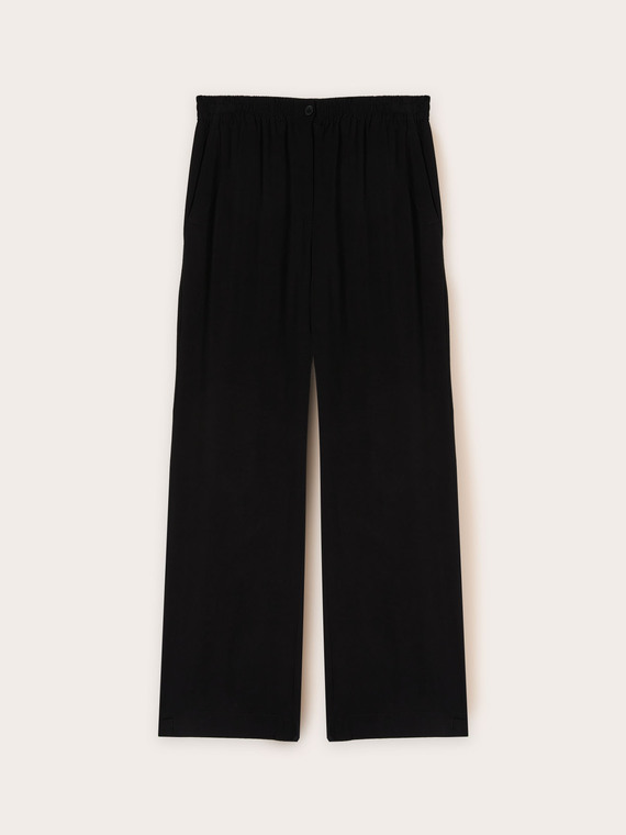 Fluid trousers with adjustable hem