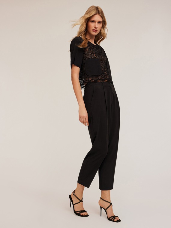 Trousers with pleats