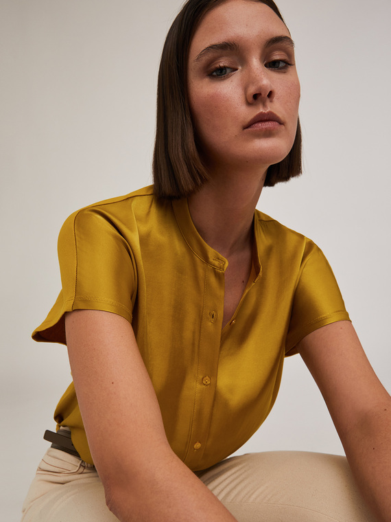 Blusa bimaterica con colletto alla coreana