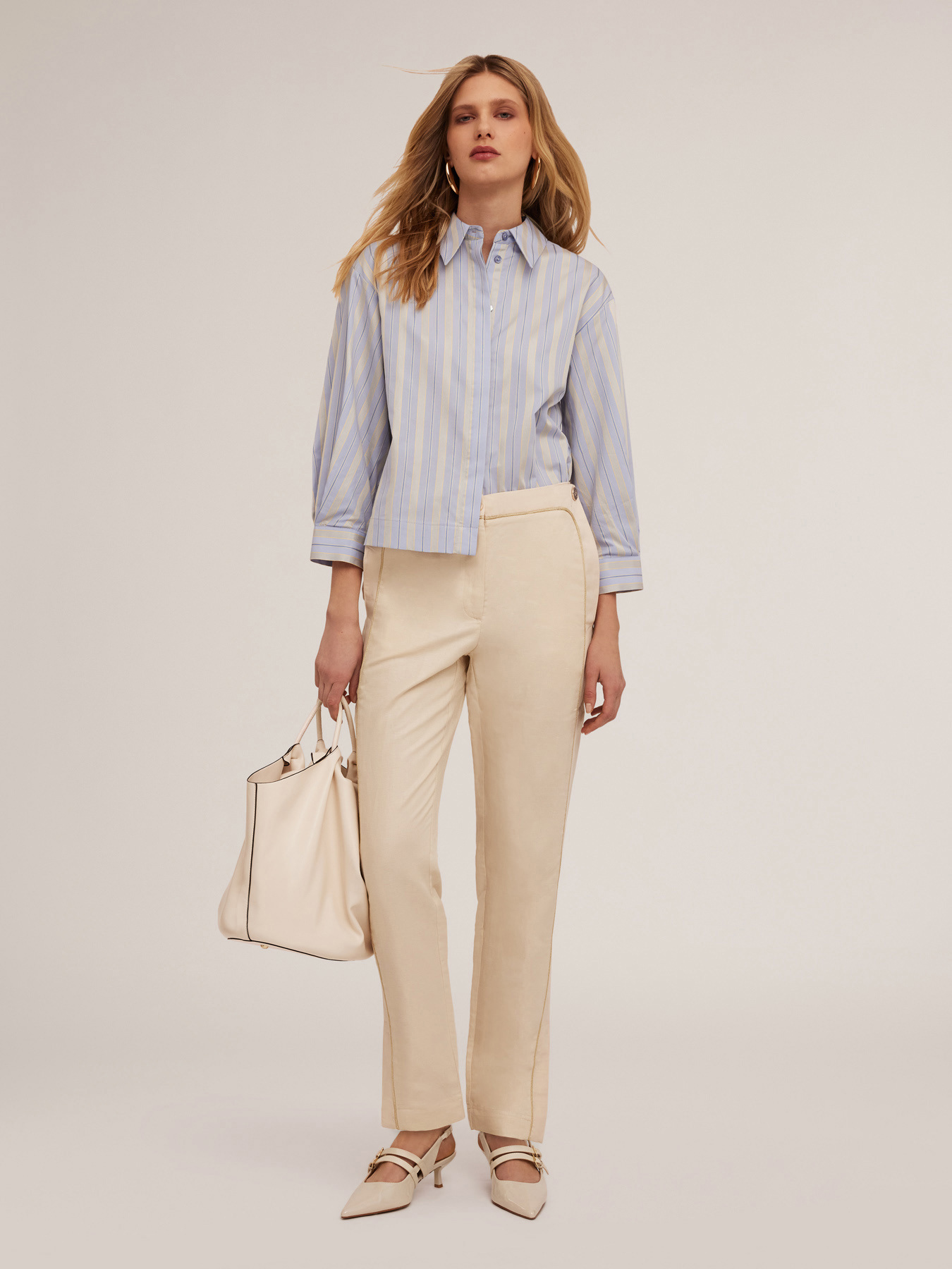 Trousers with piping and slit at the hem image number 2