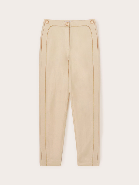 Trousers with piping and slit at the hem