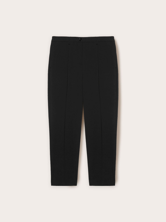 Trousers with pleats