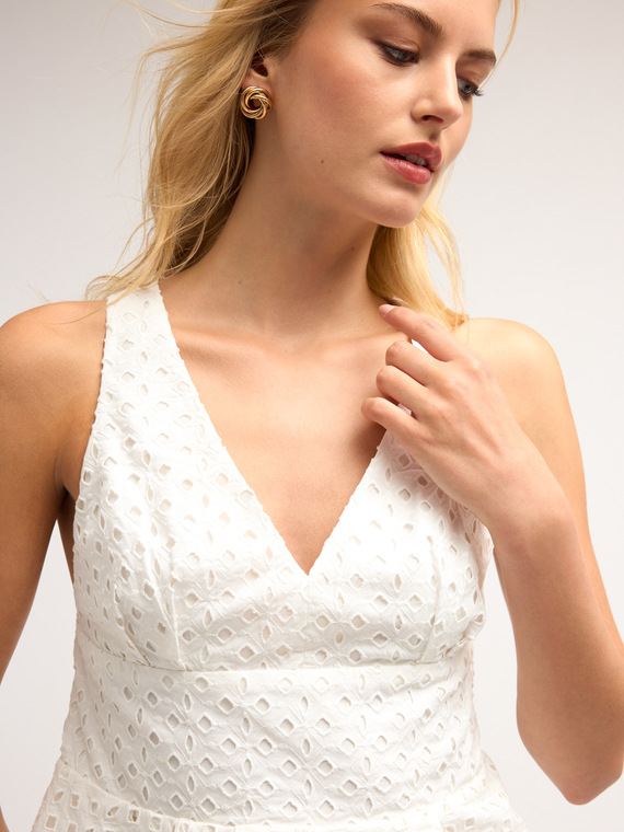 Top in sangallo con balze