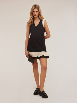 Robe bicolore avec jupe pliss&eacute;e