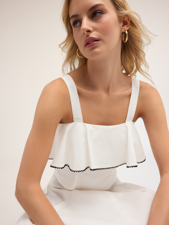 Top in popeline con balza