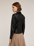 Coated fabric winter jacket with shaping cuts image number 1