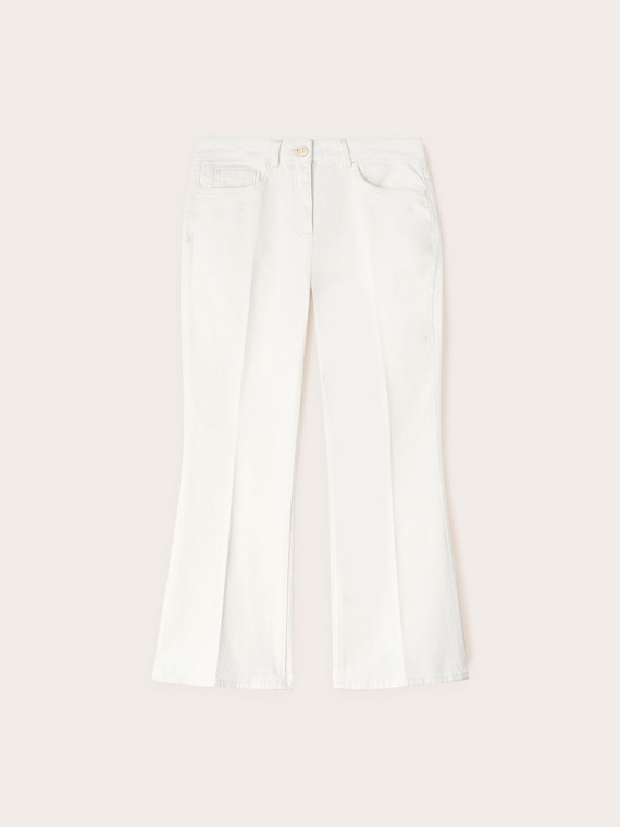 Pantaloni kick flare in drill di cotone
