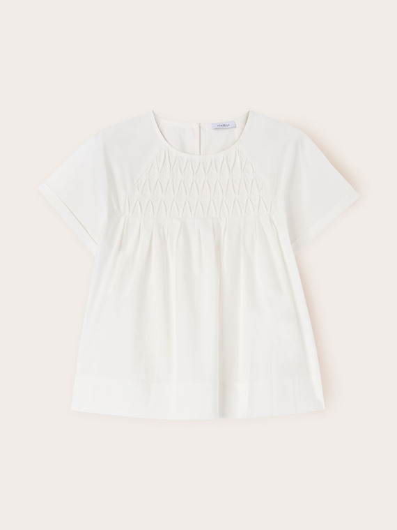 Blusa trabajada en popelina