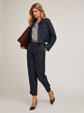Trousers with denim effect strap on the hem