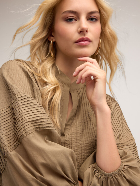 Blusa over con motivo pieghe