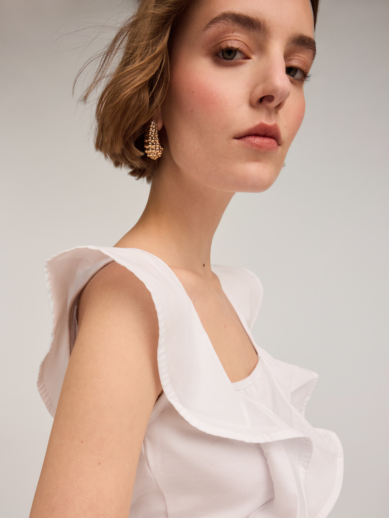 Top en tejido de punto con volantes image number 3