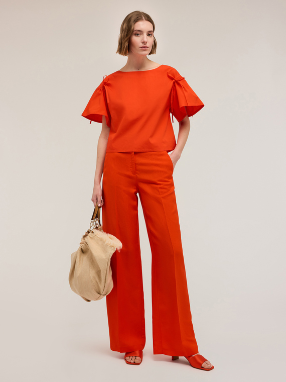 Blusa con coulisse sulle maniche