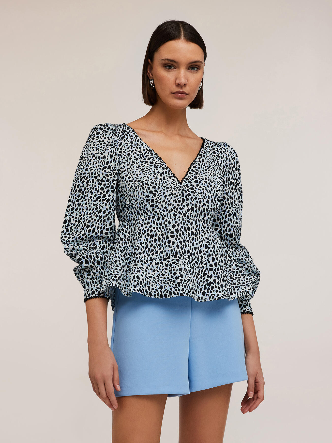 Top peplo maniche lunghe fantasia animalier image number 2