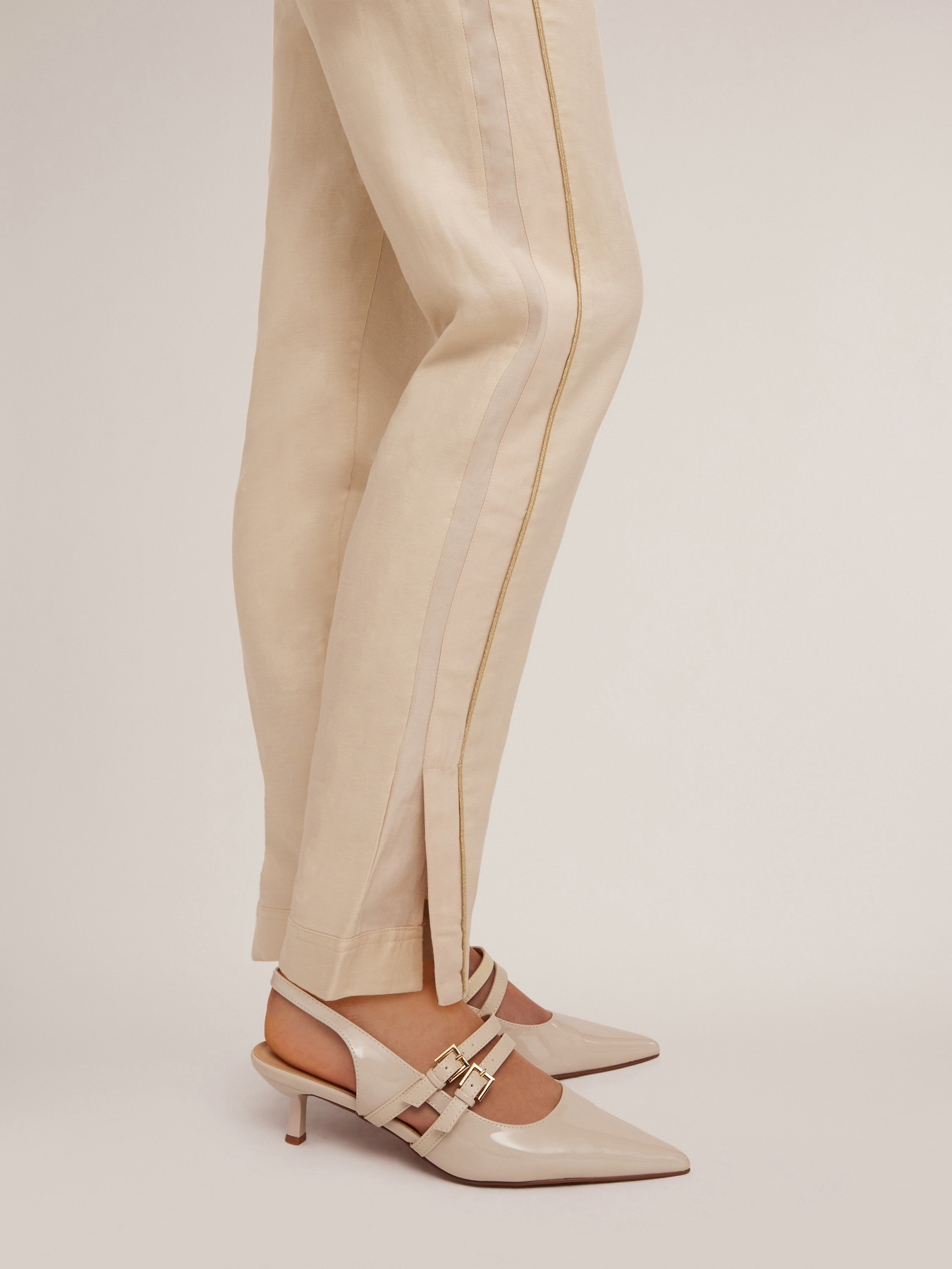 Trousers with piping and slit at the hem image number 3