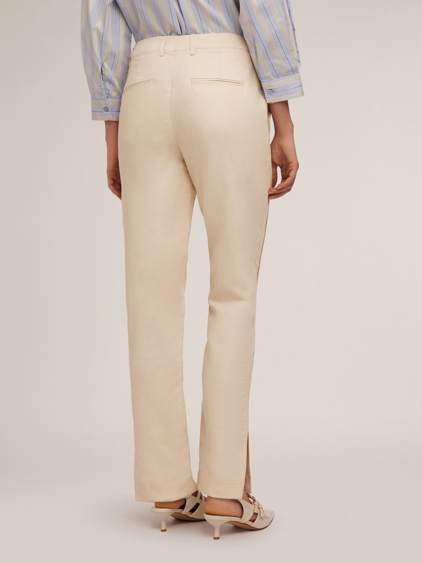 Trousers with piping and slit at the hem image number 1