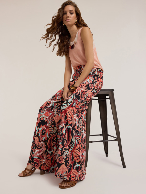 Flowing palazzo pants with ethnic pattern