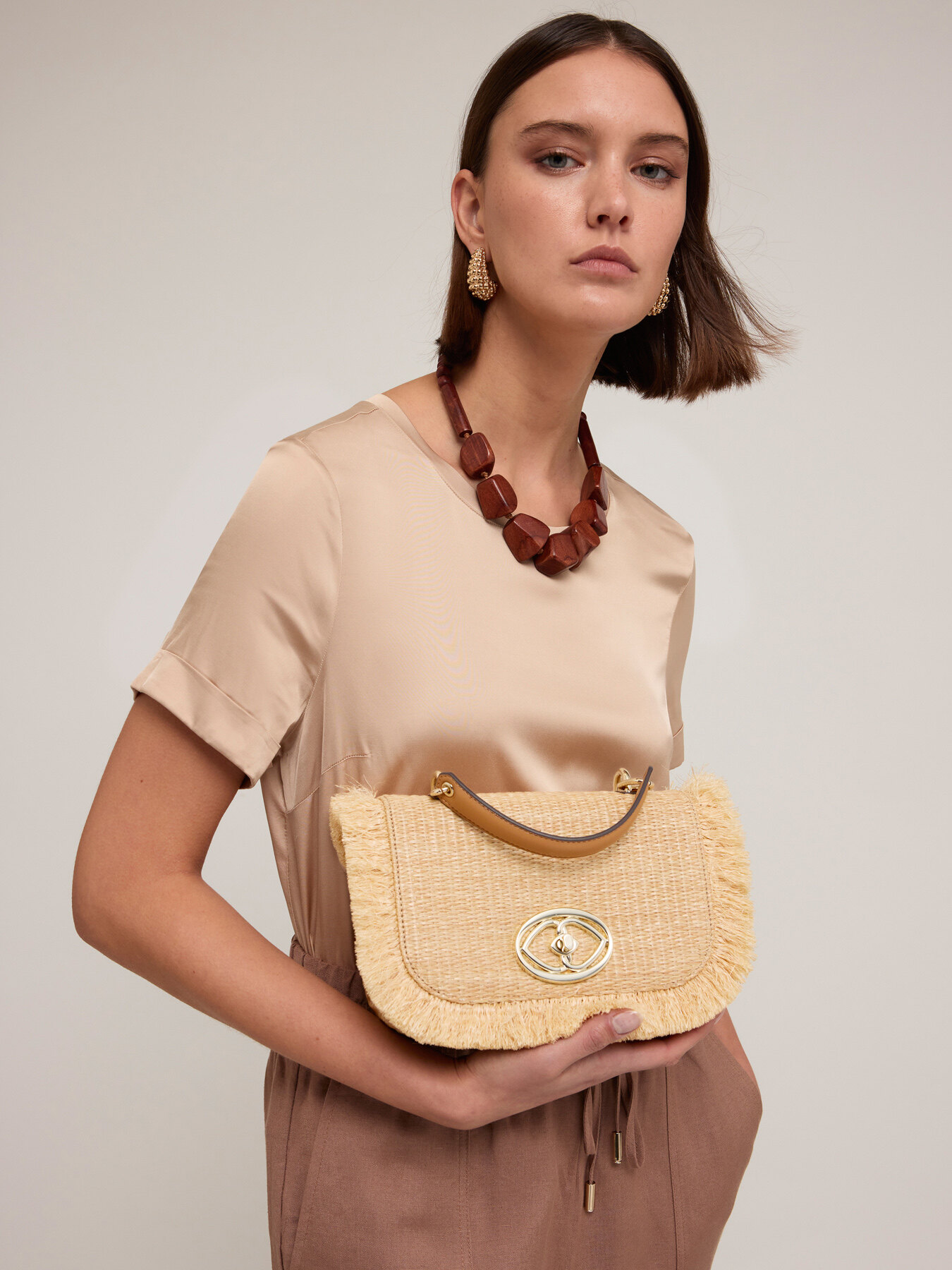 Small bag in straw effect fabric image number 0